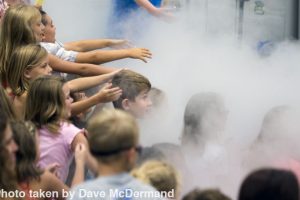 Children having a blast as they touch a nitrogen cloud