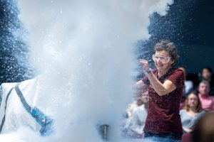 Dr. Tatiana pours liquid nitrogen into boiling water to create a massive cloud!
